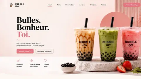 Écran de démonstration pour un salon de bubble tea : « Bulles. Bonheur. Toi », trois bubble teas alignés sur une pierre claire.
