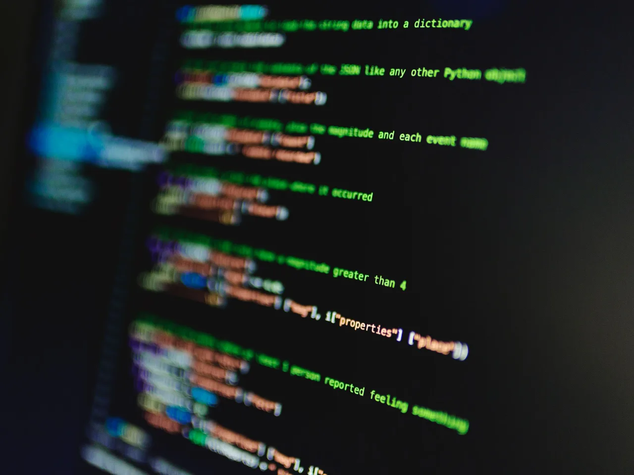 Du code affiché sur un écran, vu de biais, sans aucune interface d'éditeur autour.