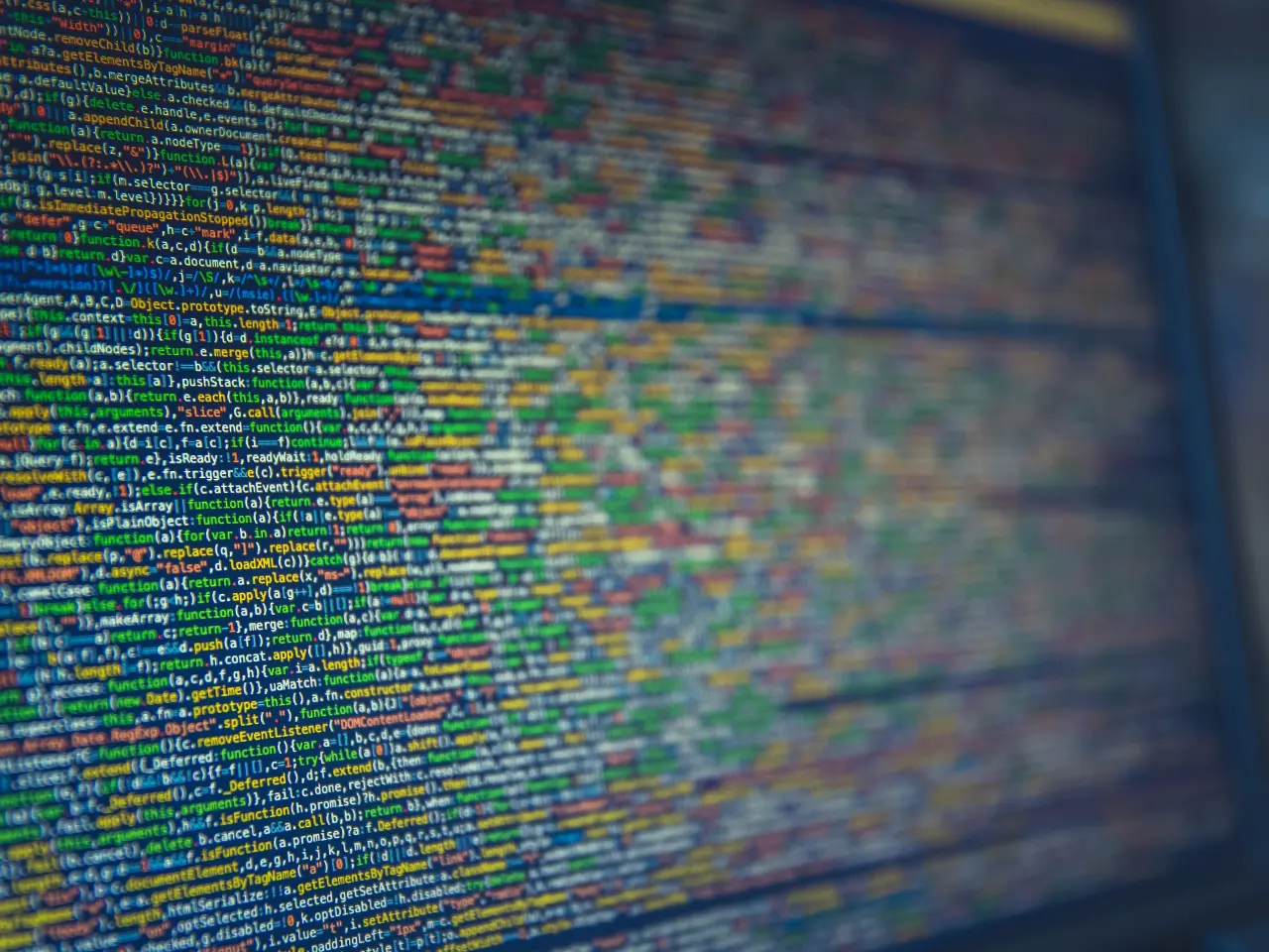 Du code couleur sur un écran, vu de très près.